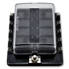 Top view of fuse block with clear hinged cover, numbered slots, mounting stud and side blade terminals
