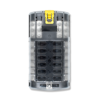 Front view of Bluewater fuse block with translucent cover showing 12 slots, yellow latch and mounting hole.