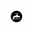 Close-up of actuator's circular black label with white faucet icon and "FRESH" text