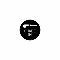 Close-up of actuator control face showing black circular label with white knob icon, left arrow and "SHADE IN".