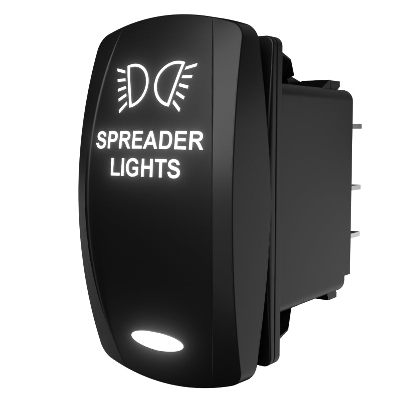 Backlit rocker switch labeled 'SPREADER LIGHTS' angled to show rear connector pins and side.