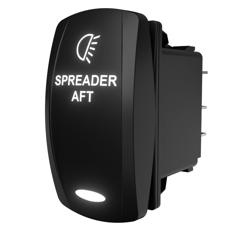 Angled rear-side view of SPREADER AFT rocker switch showing back terminals and illuminated legend