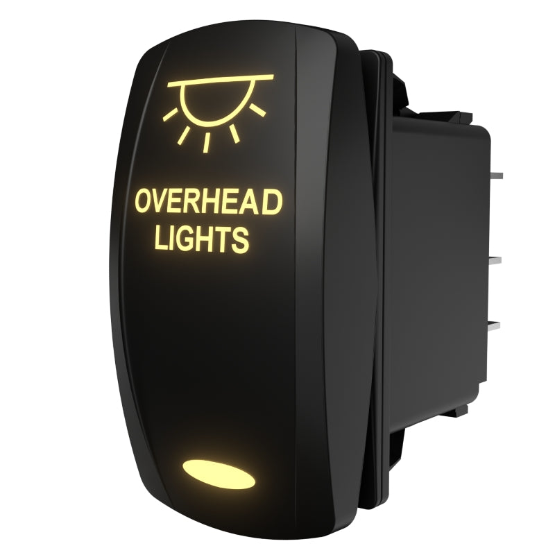 Rear-side view of illuminated black rocker switch labeled 'OVERHEAD LIGHTS' showing connector pins
