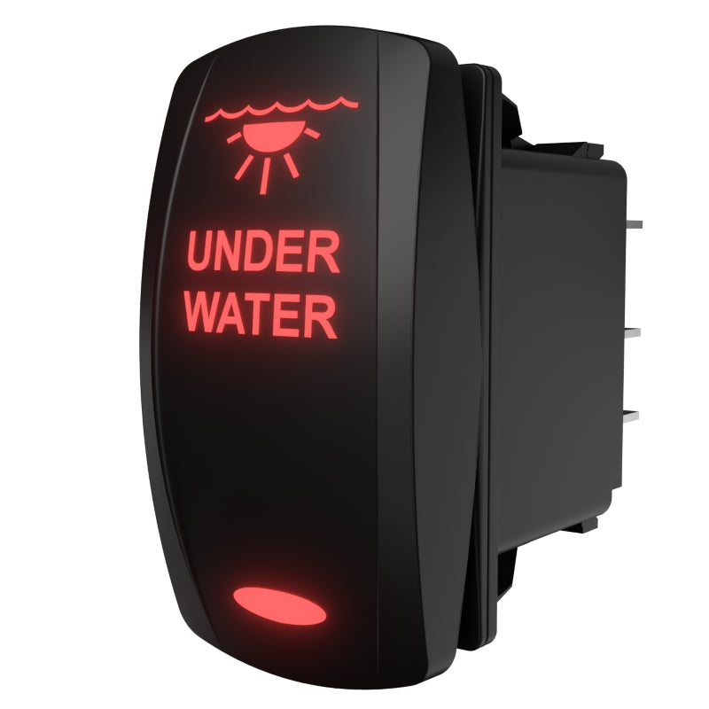Angled rear-side view of underwater light switch with red backlit UNDER WATER and exposed connector pins.