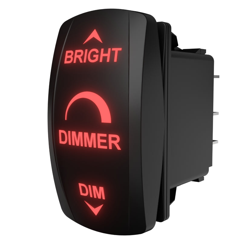Carling Technologies dimmer, angled front-right view showing illuminated red labels and rear connector pins