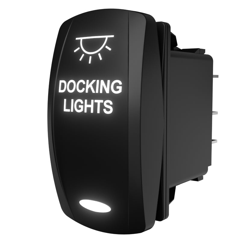 Rocker switch front and right-side view showing illuminated DOCKING LIGHTS legend and rear spade terminals