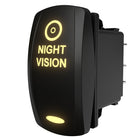 Side/rear view of illuminated "NIGHT VISION" rocker switch showing exposed electrical terminals and mounting clip