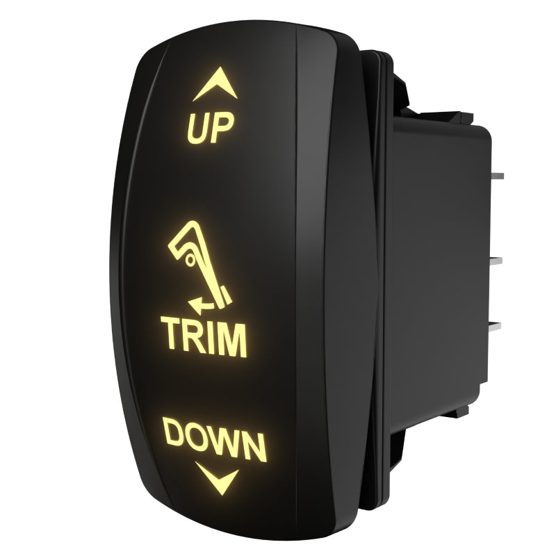 Right-side rear angle of Carling trim rocker switch showing illuminated UP/TRIM/DOWN and spade terminals.