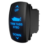 Starboard trim-tab rocker switch, angled rear/side view with blue backlit legend and exposed connector pins.