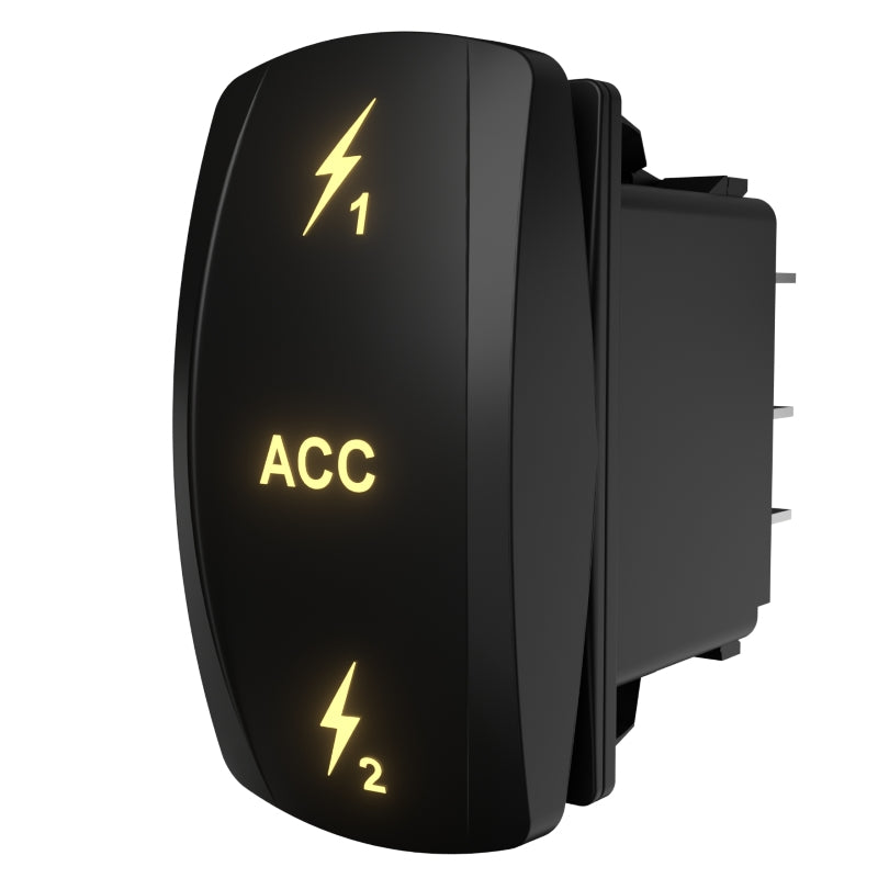 Carling ACC 1/2 illuminated rocker switch, side/rear angle showing glowing ACC legend and spade terminals