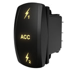 Carling ACC 1/2 illuminated rocker switch, side/rear angle showing glowing ACC legend and spade terminals