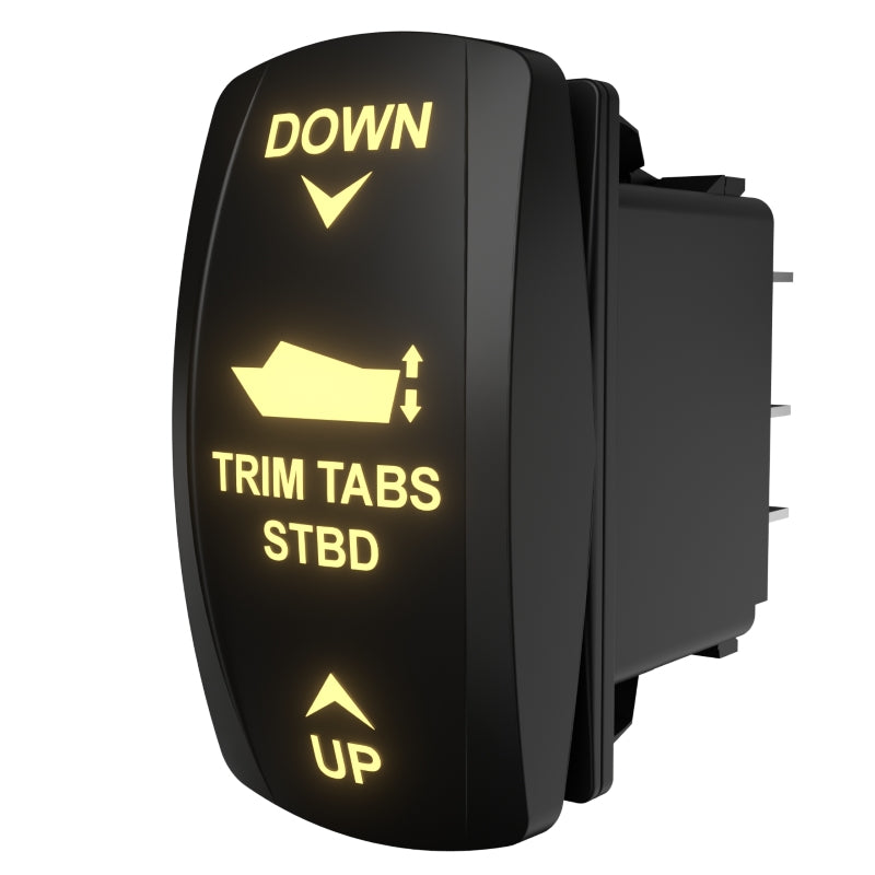 Angled rear view of a starboard trim tabs rocker switch with illuminated labels and visible connector pins