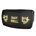 Carling bait well rocker switch, angled front-right view showing illuminated FWD/AFT icons and side connector