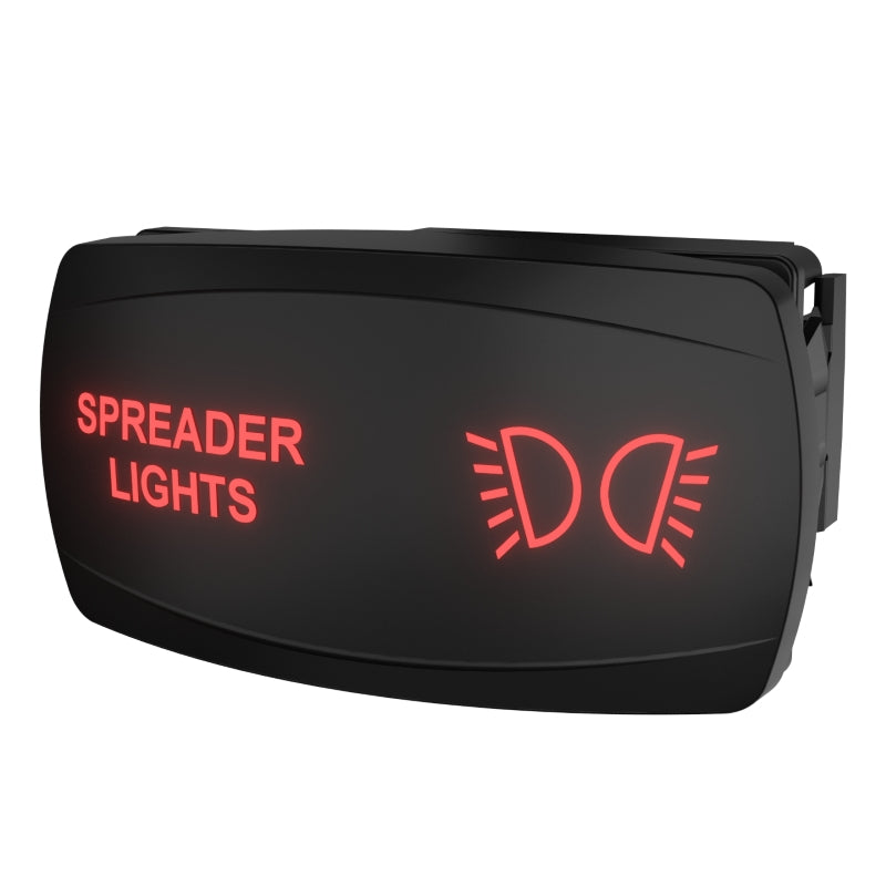 Angled view of black rocker switch labeled 'SPREADER LIGHTS' with red lamp icons and rear mounting clip.