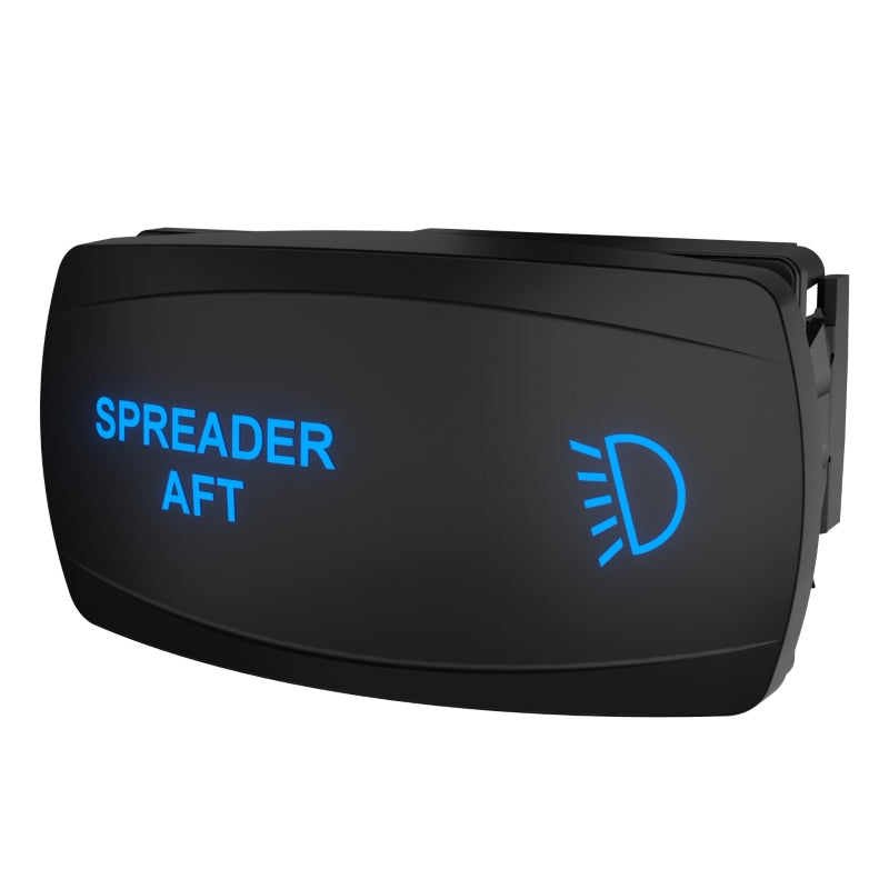 Angled front-right view of SPREADER AFT rocker switch showing blue backlit legend and exposed rear connector.