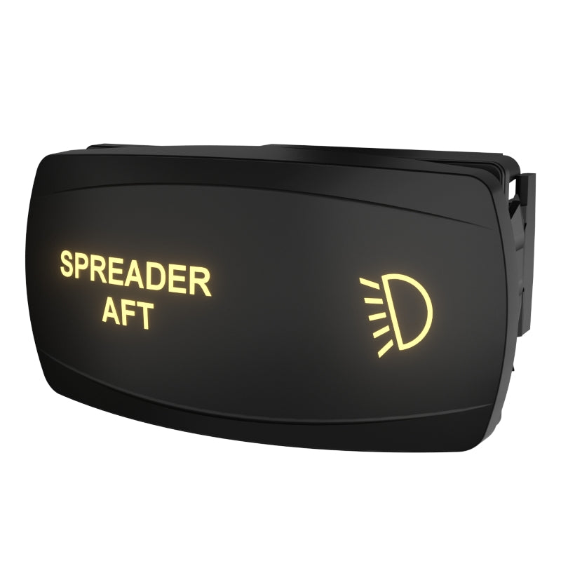 Front-right angled view of illuminated SPREADER AFT switch, showing headlight icon and connector.