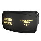 Carling Technologies underwater rocker switch, angled with illuminated UNDER WATER text and rear mounting clip visible