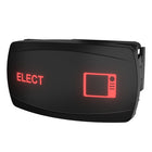 Angled front-right view of illuminated rocker switch with red 'ELECT' label, monitor icon and rear mounting clips.