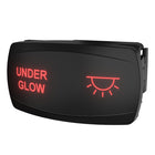 Angled front view of illuminated black rocker switch labeled "UNDER GLOW" with red backlit icon