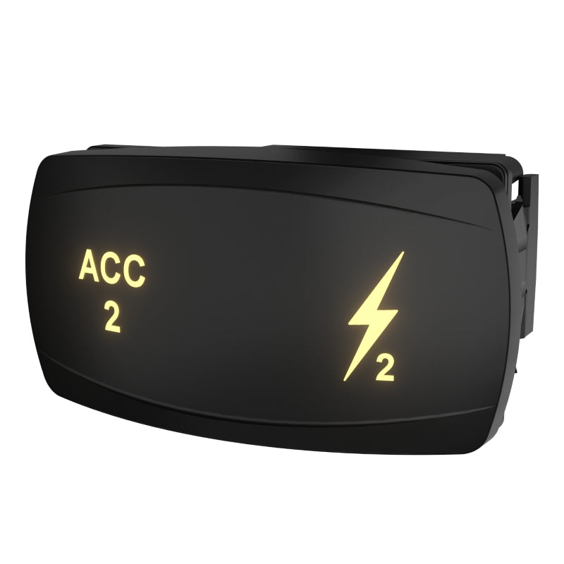 Carling ACC 2 rocker switch, angled front, illuminated "ACC 2" with lightning-bolt icon; side clip visible
