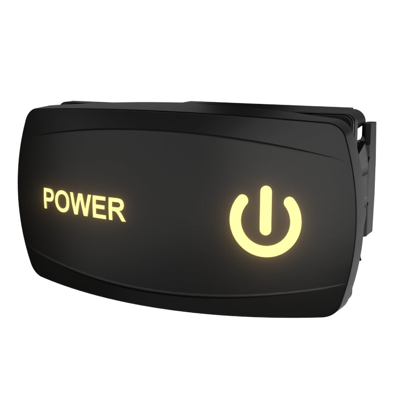 Illuminated Carling power rocker switch, angled front-right view with glowing POWER label, icon and rear clip.