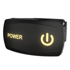 Illuminated Carling power rocker switch, angled front-right view with glowing POWER label, icon and rear clip.