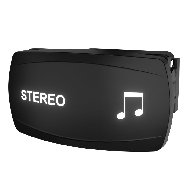 Angled view of Carling rocker switch with illuminated STEREO label, music-note icon, and side mounting clip