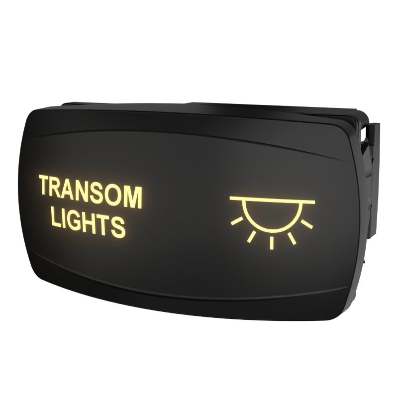 Front-right angled view of illuminated rocker switch showing TRANSOM LIGHTS text, sun icon and rear connector