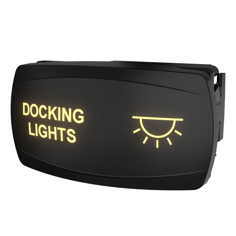 Docking lights rocker switch, angled front-right view showing illuminated legend and rear connector.