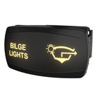 Angled front-right view of Carling bilge lights switch, lit label and icon with visible side mounting clip.