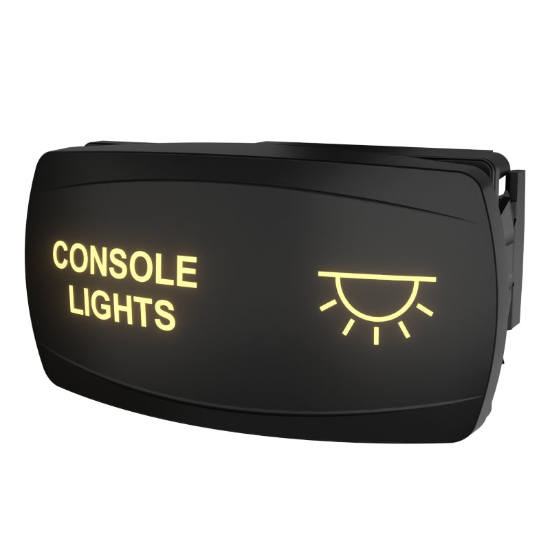 Angled front view of Carling console rocker switch, illuminated legend and icon, side mounting clip shown