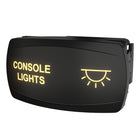 Angled front view of Carling console rocker switch, illuminated legend and icon, side mounting clip shown