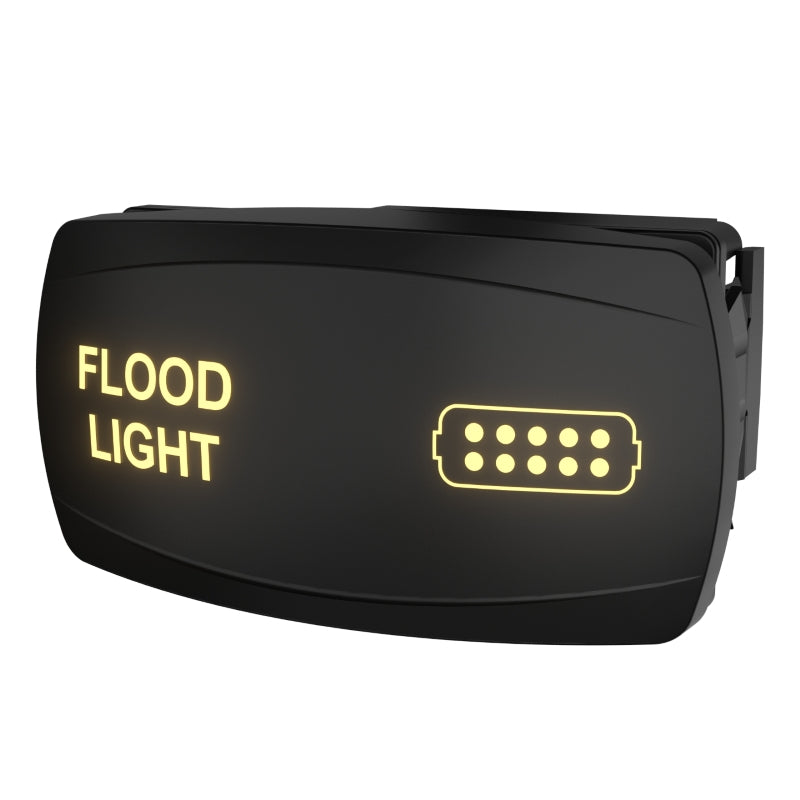 Carling Technologies flood light rocker switch, angled view showing illuminated legend and rear connector