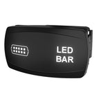 Angled front view of LED-bar switch showing illuminated legend, LED icon and side mounting clip.