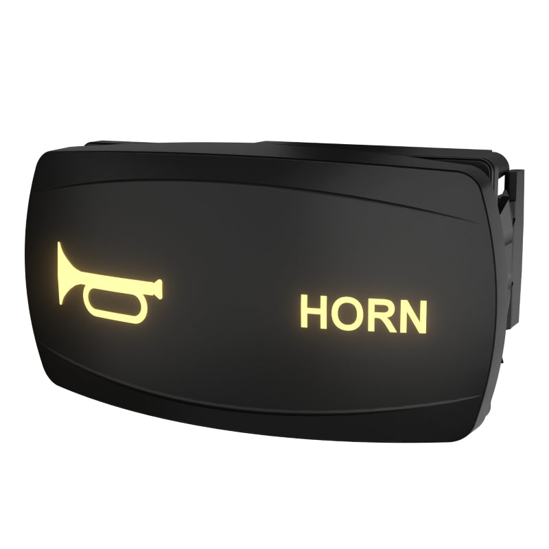 Angled front view of illuminated horn rocker switch showing horn icon, "HORN" text and side mounting clip.
