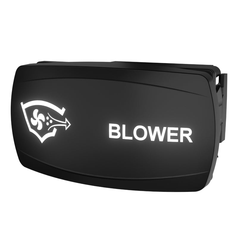 Angled front view of illuminated black rocker switch labeled BLOWER with fan icon and visible right-side mounting clip.
