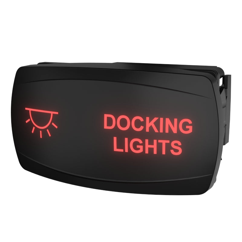 Angled front view of docking lights switch showing red 'DOCKING LIGHTS' text, light icon and side connector.