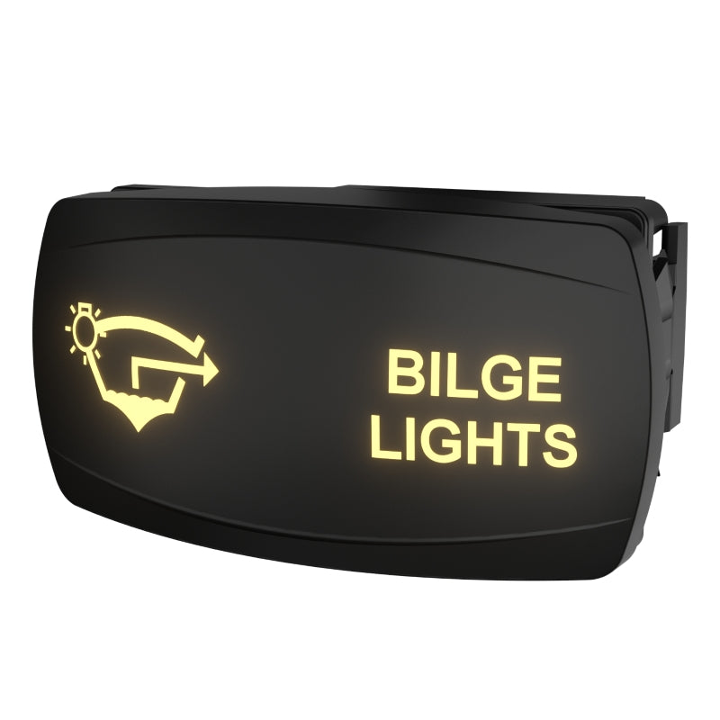 Angled front-right view of illuminated BILGE LIGHTS rocker switch, showing lit icon and rear mounting clip.