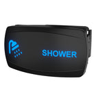 Angled right-side view of black rocker switch with blue shower icon and 'SHOWER', mounting clip visible.
