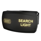 Angled side view of marine rocker switch labeled SEARCH LIGHT showing illuminated legend and rear connector.