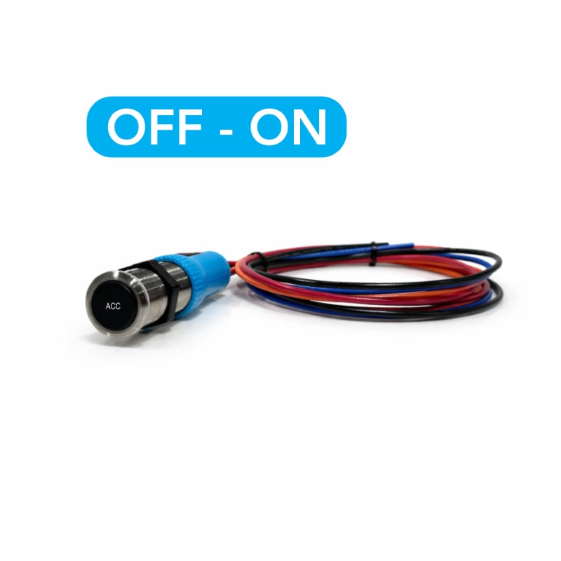Metal push-button labeled "ACC" shown at slight angle with coiled red, blue, black wires and mounting nut