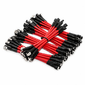 A bundle of red and black battery cables with metal terminal connectors, arranged in a crossed stack on a plain white background.