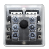 Bluewater 6 & 12 Position breaker block with transparent cover, six capped posts and central knob