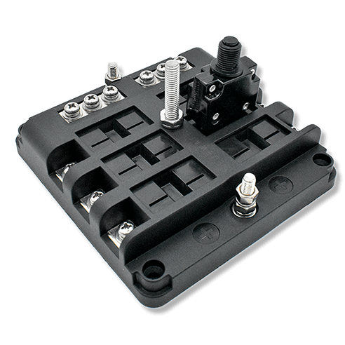 Angled top-side view of the breaker block showing terminal studs, circuit breaker module and mounting holes.