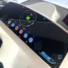 Angled Whaler 18 Dauntless switch panel with lit round buttons, labels, tach and covered power sockets