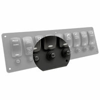 A marine toggle switch panel with multiple labeled switches including horn, anchor lights, navigation lights, sun water, crew lights, and electrical, shown with a circular inset highlighting the black rocker switches.