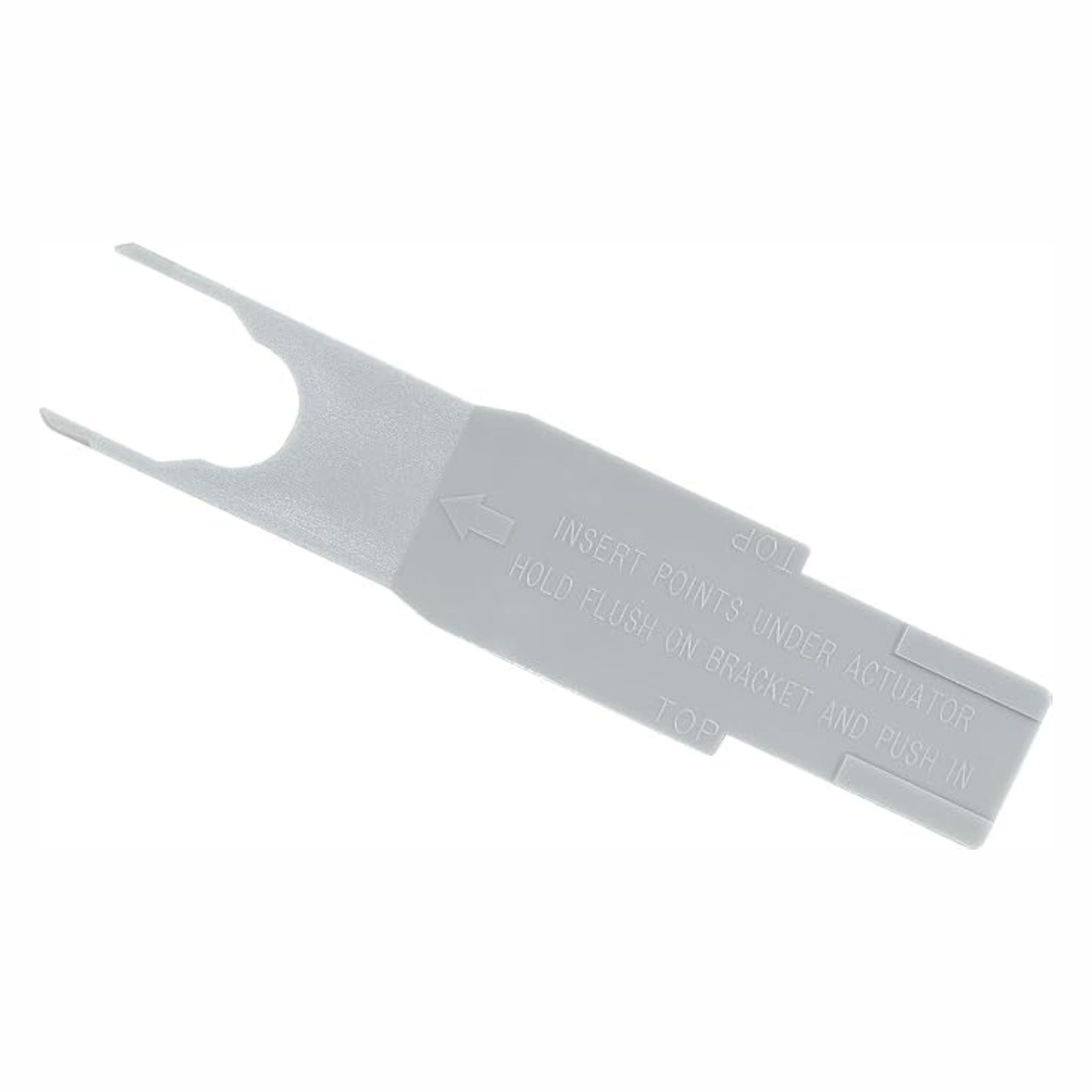A light gray plastic automotive tool with molded instructions and an arrow, shown on a plain white background.