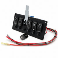 A 4-spoke black control panel with four toggle switches and a separate black remote, accompanied by a bundle of red, gray, and black wiring harnesses on a white background.