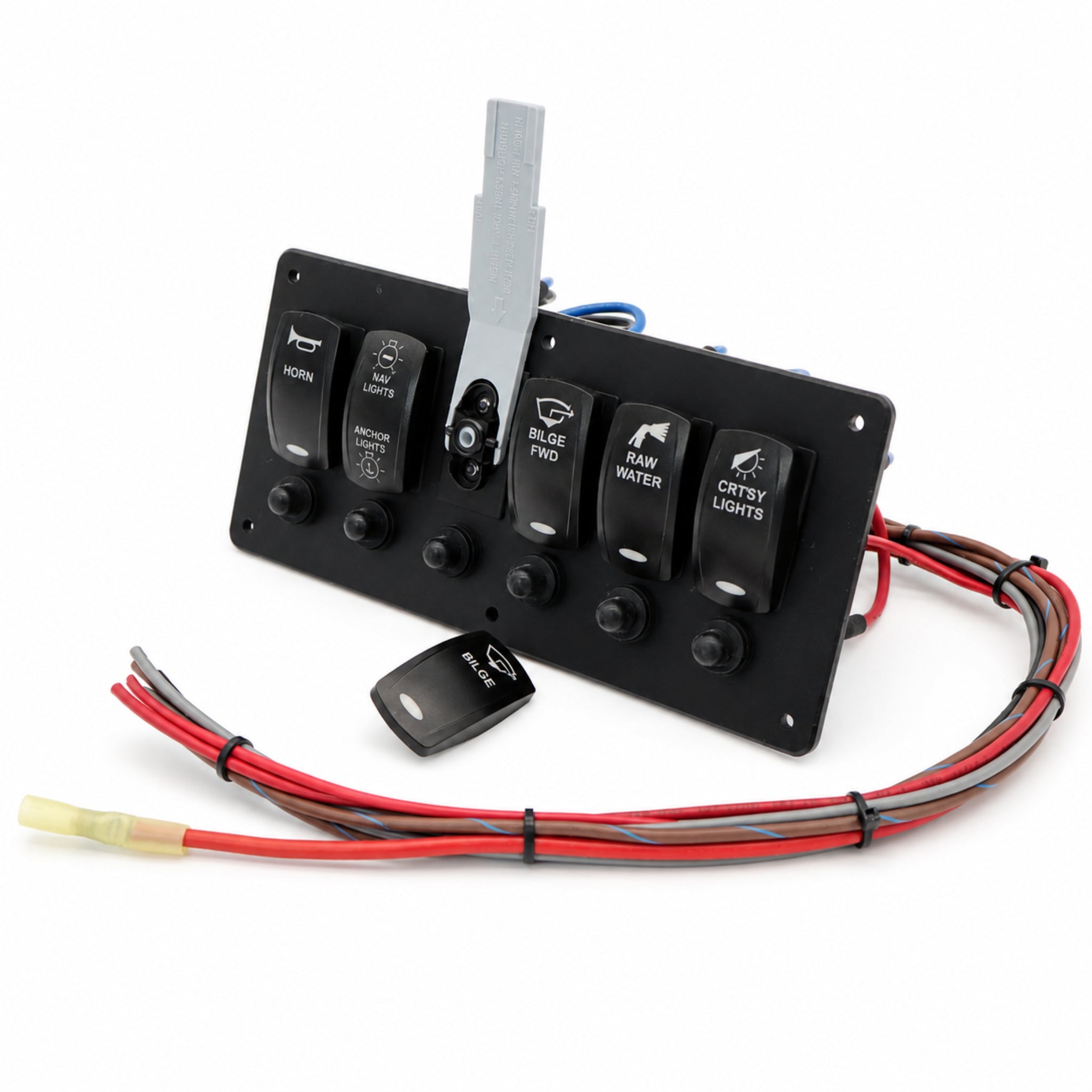 A 4-spoke black control panel with four toggle switches and a separate black remote, accompanied by a bundle of red, gray, and black wiring harnesses on a white background.