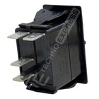 Rear-side view of Carling Technologies ACC rocker switch showing four flat spade terminals and mounting bezel